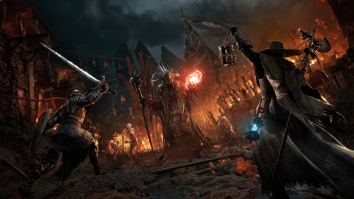 Two players fighting a fire-casting boss in Lords of the Fallen.