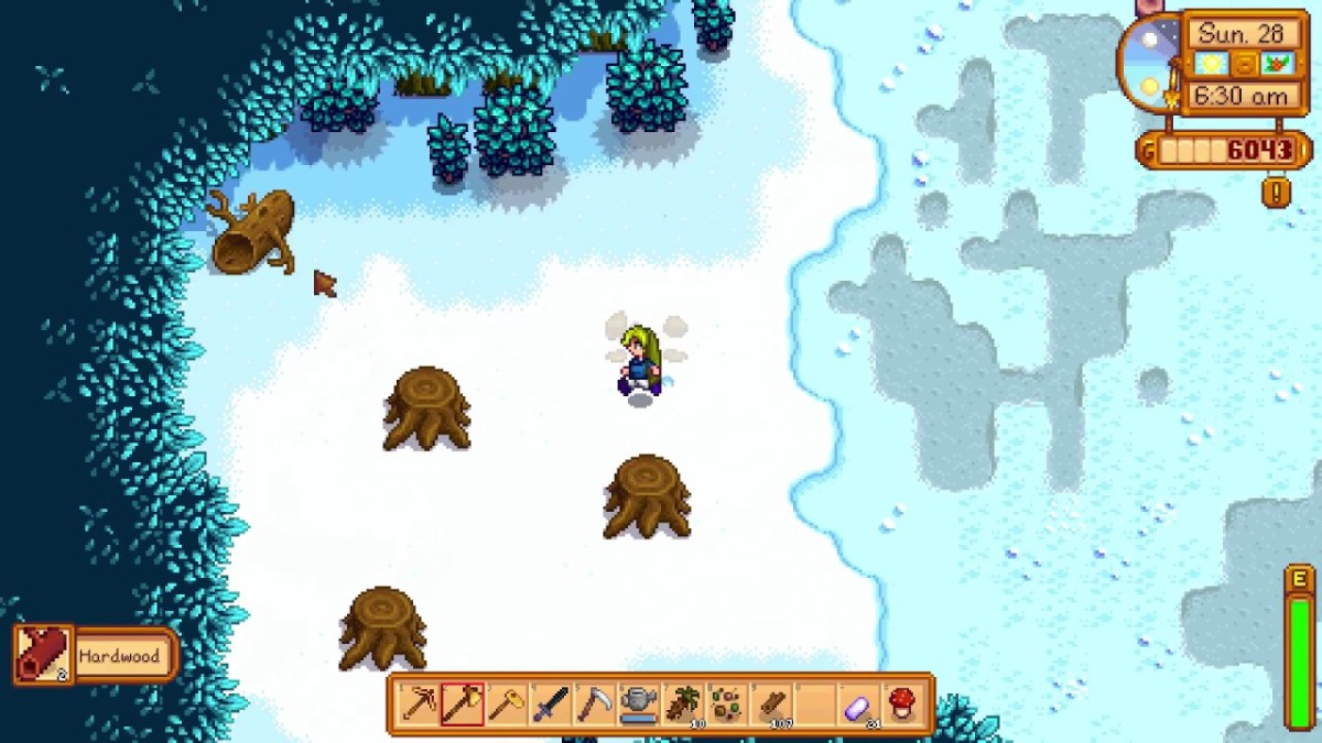 Ein Spieler im Wald im Stardew Valley.  Dieses Bild ist Teil eines Artikels darüber, wie man Hartholz in Stardew Valley bekommt.