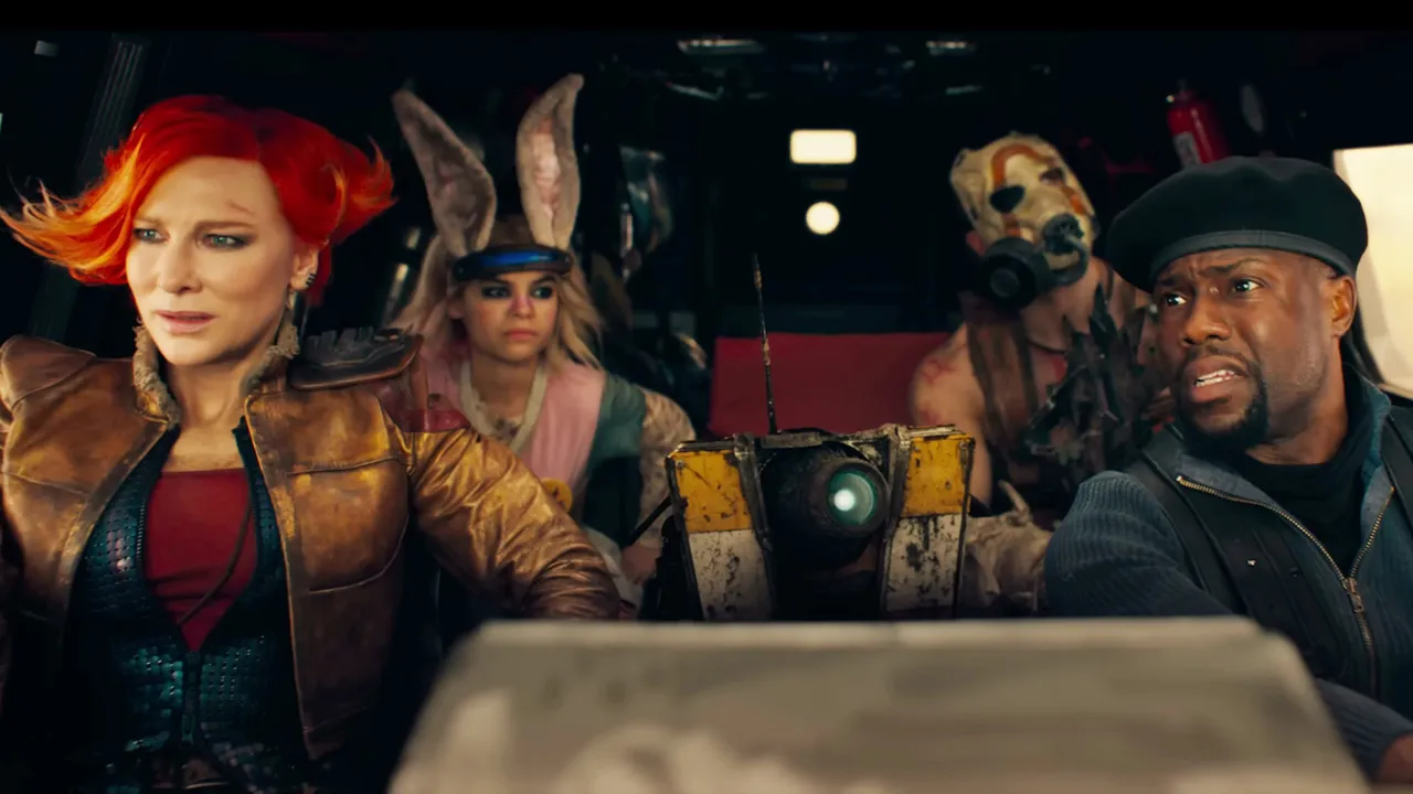 Four people in strange costumes, in Borderlands the movie, inside a truck.