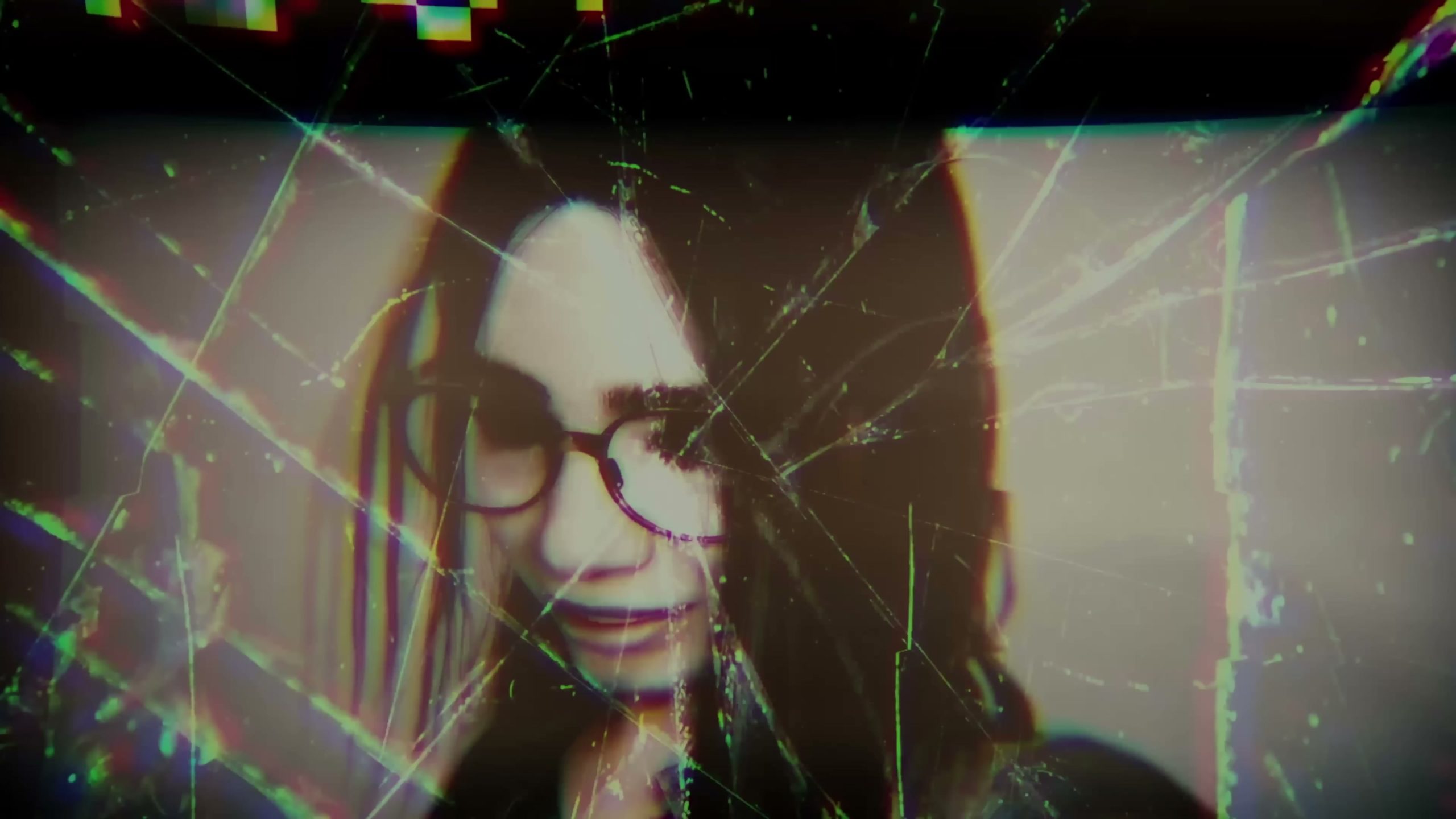 Silent Hill: The Short Message. A girl with glasses in a scratched-out photograph.